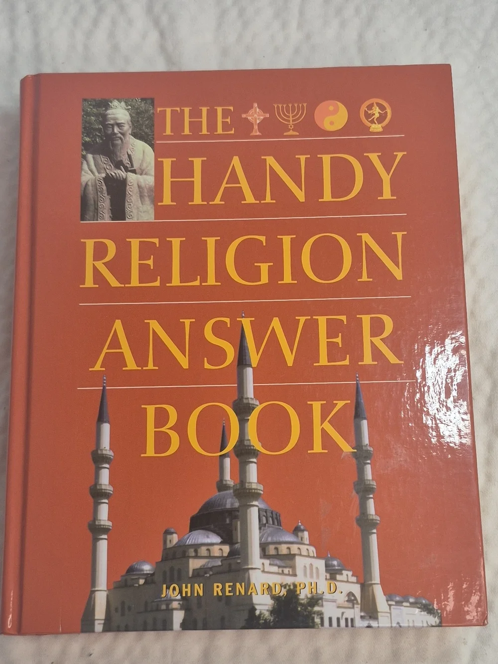 The Handy Religion Answer Book by John Renard - Orange Hardcover